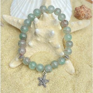 Beaded bracelet - light green and silver tone with starfish charm